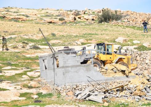 Demolition of a residential structure in Khirbet a-Rakeez. Photo by Nasser Nawajah, B'Tselem, 27 Feb. 2020