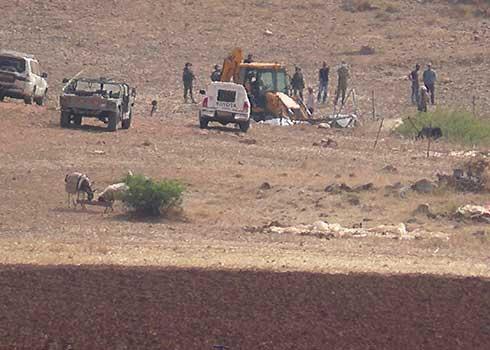 Demolition one of the tenst in Khirbet a-Ras al-Ahmar. Photo by  'Aref Daraghmeh, B'Tselem, 14 May 2020
