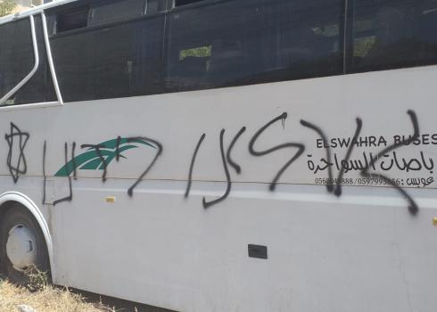 Graffiti sprayed by settlers on a bus in a-Lubban a-Sharqiyah, 9 July 2020. Photo: courtesy of the village council