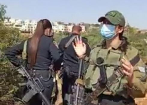 Soldiers come to ‘Amer Abu Hejleh’s land and arrest him after false complaint filed by settler. Deir Istiya, 11 Nov. 2020.  Photo courtesy of witness. 