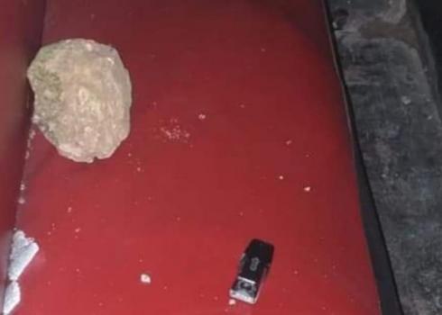 A stone thrown by settlers that smashed ‘Abd al-Karim Abu Shhadeh’s windshield, Burin, 21 Jan. 2021