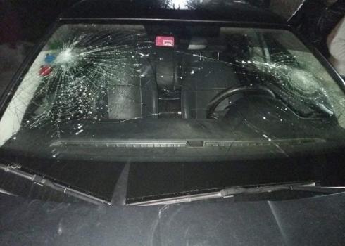 The al-Haj family’s car, damaged by settlers in Bruqin, 6 Mar. 2021
