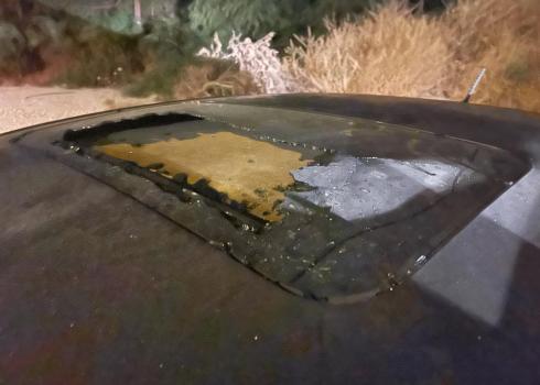 The shattered sunroof of the Abu ‘Awad family’s car. Photo courtesy of the family. 