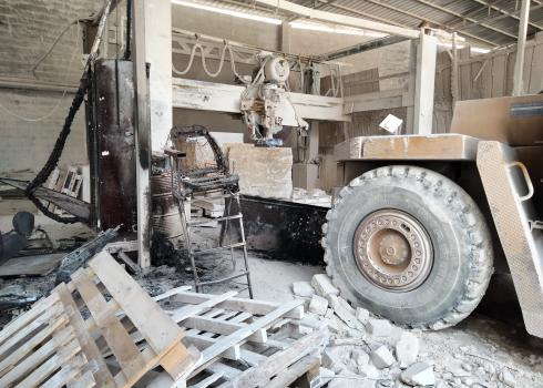 Burned machines in the stone mill. Photo by Salma a-Deb’i, B’Tselem, 25 July 2021 