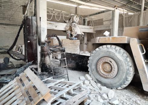Burned machines in the stone mill. Photo by Salma a-Deb’i, B’Tselem, 25 July 2021