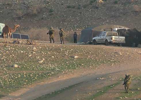 Soldiers near the homes of the community of Um al-Jamal in the northern Jordan Valley. Photo by ‘Aref Daraghmeh, B’Tselem, 11 Jan. 2021 