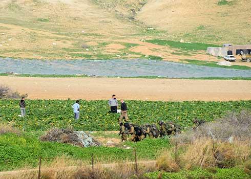 Soldiers training on al-Farisiyah’s land. Photo by ‘Aref Daraghmeh, B’Tselem, 7 Feb. 2022 