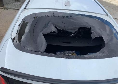 One of the cars’ smashed windows. Courtesy of family.  