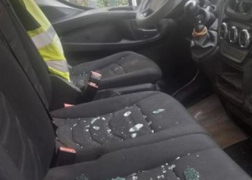 Glass shards from the shattered window on the passenger seat. Photo courtesy of the driver, 29 Oct. 2022  