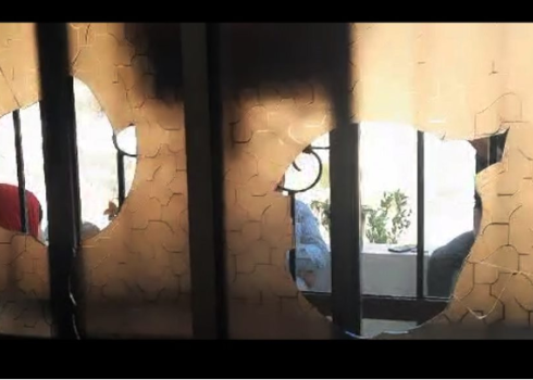 One of the windows smashed by the settlers . Photo by Salma a-Deb’i, B’Tselem