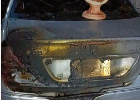 The burnt car in Muhammad a-Dmeidi’s yard. Photo courtesy of a-Dmeidi.  