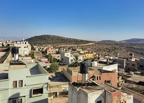 View of farmland and the security road from the village. Photo: Abdulkarim Sadi, B’Tselem 