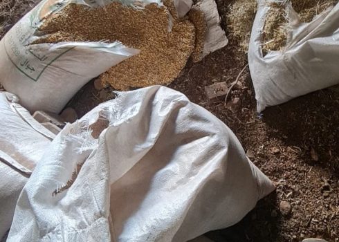 Sacks of barley destroyed by settlers in the family’s shed. Photo courtesy of the family