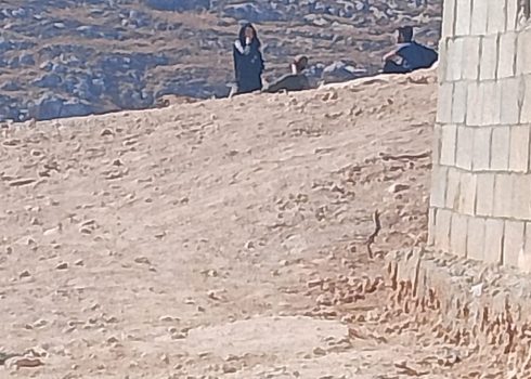 Settlers near the family home. Photo courtesy of the family 