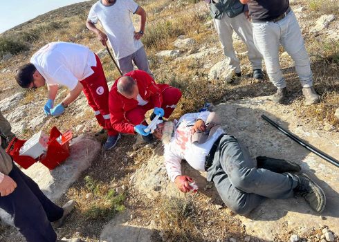 Na’im Hamamdeh receiving treatment after his attack. Photo: Basel al-Adrah, B’Tselem