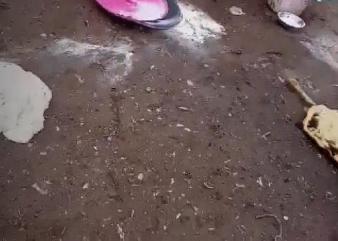 The dough, flour, and bread that the settlers threw on the ground. Still from video footage courtesy of residents