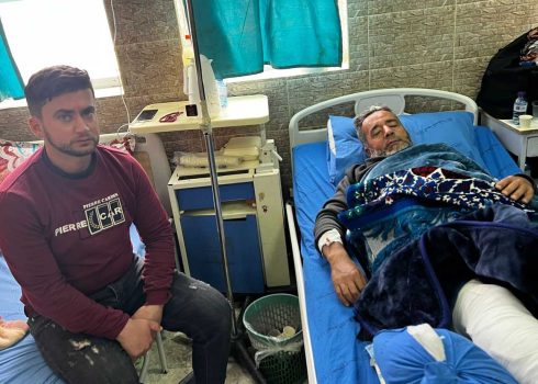 Mahmoud al-Jundi at the hospital with his son Muhammad. Photo courtesy of the family 