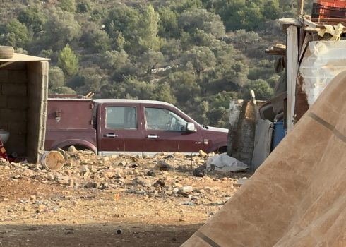 A settlers’ vehicle near the community’s residential compound. Photo courtesy of local residents