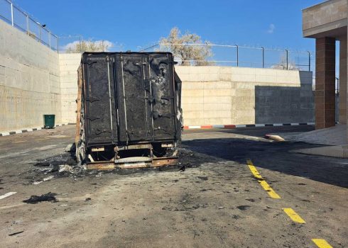 The burned-out shells of trucks torched by settlers in the al-Juneidi factory yard. Photo by Abdulkarim Sadi, B’Tselem