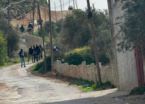 Armed settlers at the entrance to Talfit. Photo courtesy of residents 