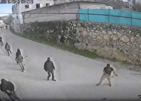 Settlers entering Jalud. Still from security camera footage, courtesy of the residents