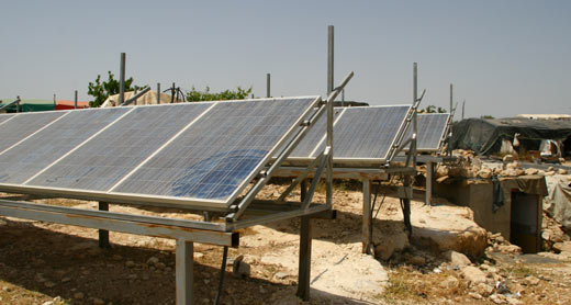 Solar panels constructed by Comet-ME supply electricity to residents of Khirbet Susiya, South Hebron Hills; Israel refuses to connect the village to water and power grids, 13 June 2012. Photo: B'Tselem.