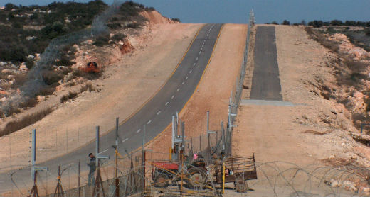 Construction of the Separation Barrier near Jayus, cutting the village off from most of its farmland. Photo by Oren Yakobovich, B'Tselem, January 2006. Construction of the Separation Barrier near Jayus, cutting the village off from most of its farmland. Photo by Oren Yakobovich, B'Tselem, January 2006.
