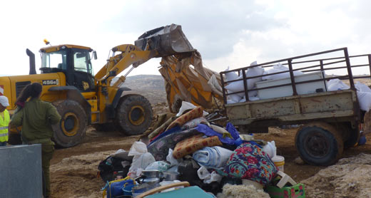 Demolition of a residential tent and a shack in Susiya. Photo: Nasser Nawaj'ah, B'Tselem,  24 Nov. 2011.