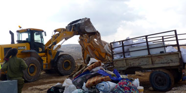 Demolition of a residential tent and a shack in Susiya. Photo: Nasser Nawaj'ah, B'Tselem, 24 Nov. 2011