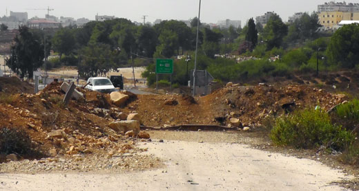 Beitin Road, blocked for 15 year, before the repaving. Photo: Iyad Haddad, B'Tselem, 4 Oct. 2012