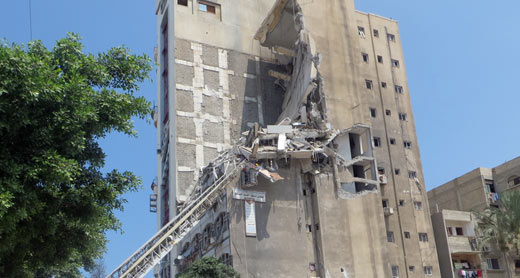 בניין המשרדים שבו נהרגו בני המשפחות כילאני ודירבאס. צילום: מוחמד סבאח, בצלם, 21.7.14