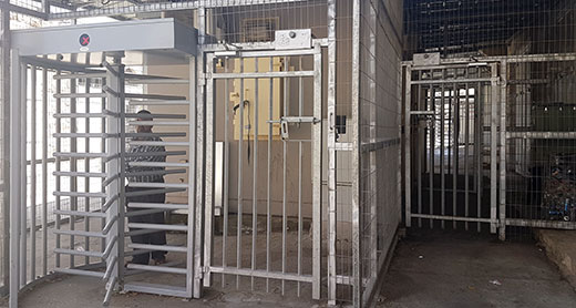 Pharmacy Checkpoint on al-Sahleh Street. In the summer of 2016, the military added an electronic security-check booth and an observation booth and has since prohibited Palestinians aged 16-30 passage to the Tomb of the Patriarchs (al-Haram al-Ibrahimi) and the a-Salaimeh Neighborhood, unless they are registered as living in the neighborhood. Photo by Iliana Mahamid, B’Tselem, 5 October 2016.