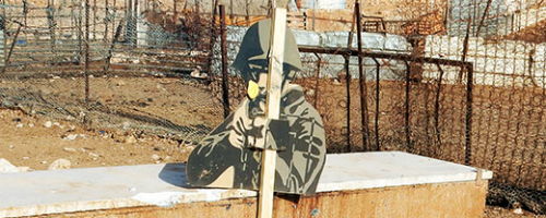 Target-practice image placed by soldiers in residential area of an al-Fajam area community, near ‘Aqraba. Photo by ‘Aref Daraghmeh, B’Tselem, 17 Oct. 2016 Target-practice image placed by soldiers in residential area of an al-Fajam area community, near ‘Aqraba. Photo by ‘Aref Daraghmeh, B’Tselem, 17 Oct. 2016