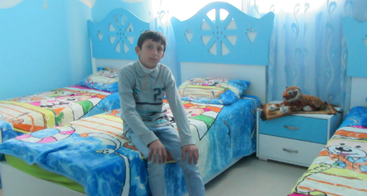 Tareq a-Shteiwi, 12, in his room. Photo by Abdulkarim Sadi, B’Tselem, 5 Jan. 2017