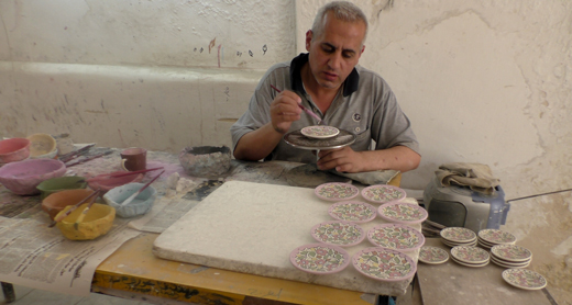 Nael Fakhuri painting his pottery. Photo by Manal al-Ja’bri, B’Tselem, 19 June 2017 Nael Fakhuri painting his pottery. Photo by Manal al-Ja’bri, B’Tselem, 19 June 2017