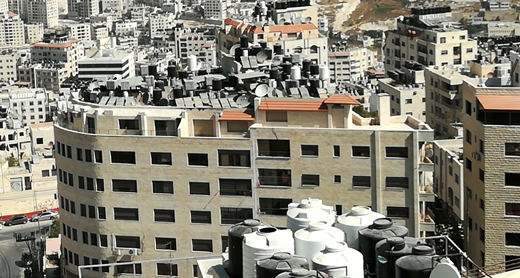 Water tanks on the roofs of Nablus homes. Photo: Salma a-Deb'i, B’Tselem, 13 September 2017. Water tanks on the roofs of Nablus homes. Photo: Salma a-Deb'i, B’Tselem, 13 September 2017.