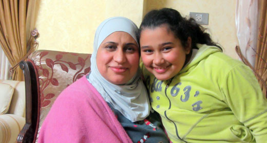 'Abir Sharaf and her daughter