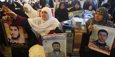 Palestinians demonstrate for the release family members imprisoned in Israel, Gaza City, 12 December 2011. Palestinians demonstrate for the release family members imprisoned in Israel, Gaza City, 12 December 2011.